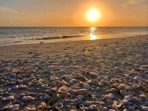On the beach, beach umbrellas - Key West Flair (Sanibel)