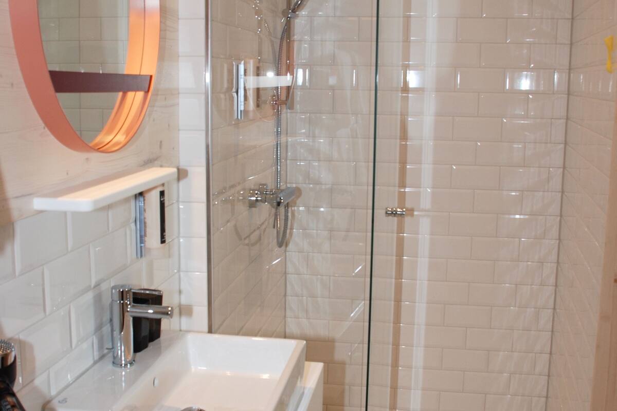 double room single use | bathroom | shower, free toiletries, hair dryer, slippers