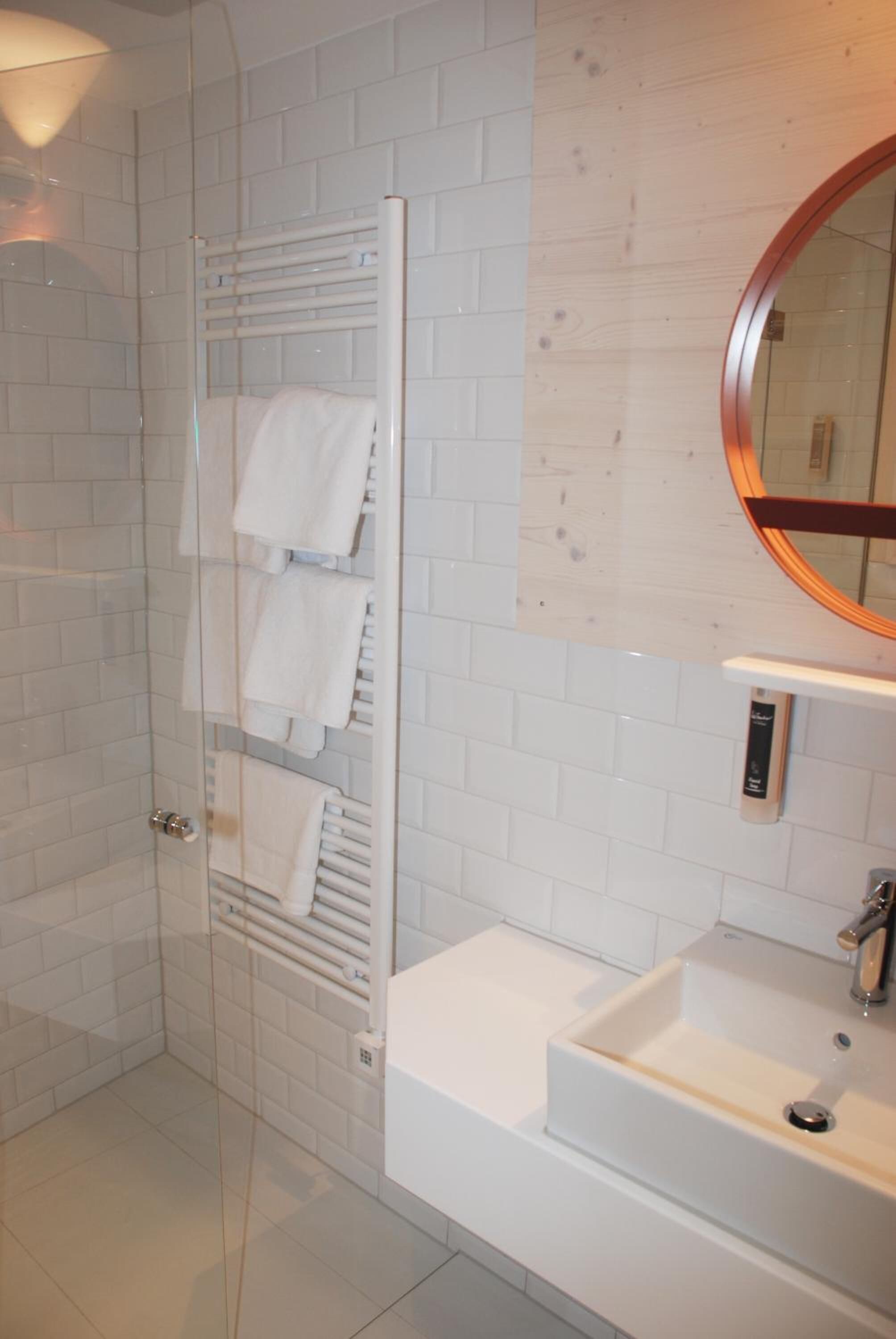 shower, free toiletries, hair dryer, slippers