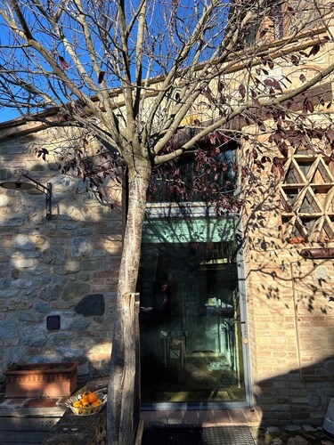 Fine renovated detached villa with fireplace and air conditioning.