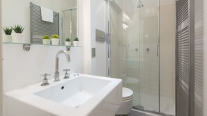 Shower, jetted bath, bidet, towels