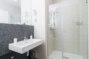 City Double Room, 1 Queen Bed, Balcony | Bathroom amenities | Shower, free toiletries, hair dryer, slippers