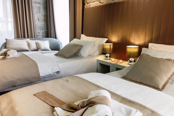 Suite Studio Premium, coin cuisine, vue ville | Literie de qualité supérieure, couette en duvet d'oie