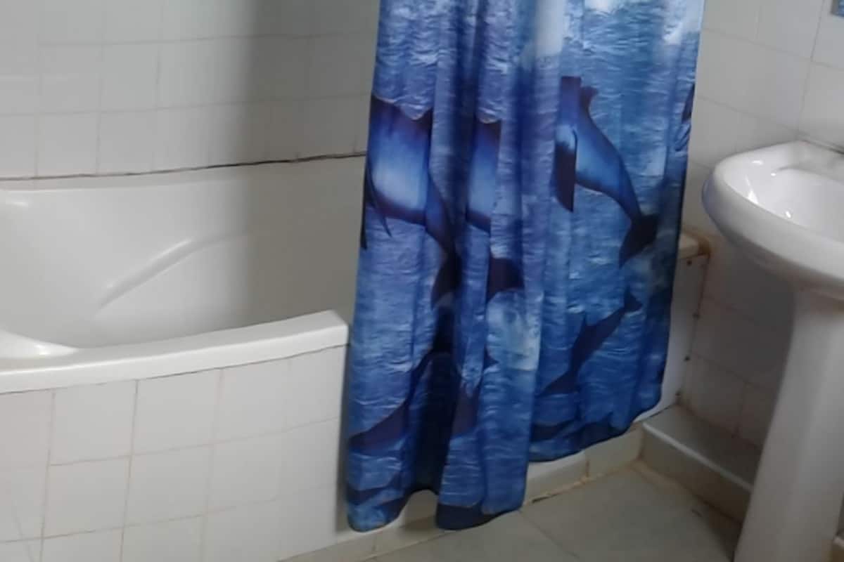 shared dormitory (4 beds) | bathroom | shower, free toiletries, slippers, towels