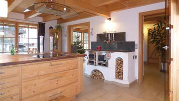 Fridge, stovetop, dishwasher, coffee/tea maker