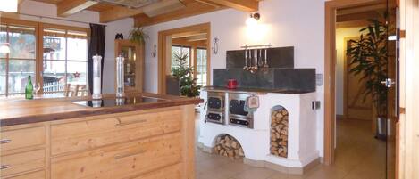 Fridge, stovetop, dishwasher, coffee/tea maker