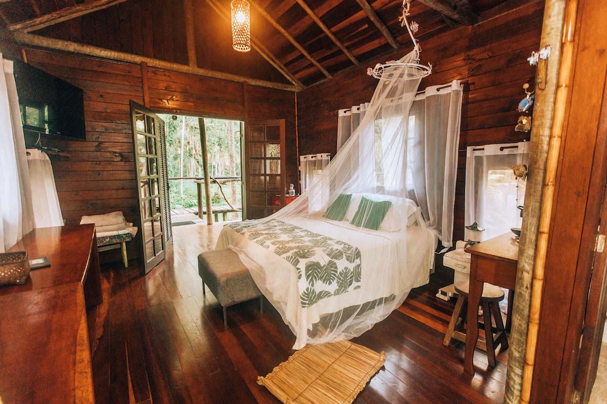 Cabane Deluxe, 1 très grand lit, vue jardin, en angle | Surmatelas, mini-bar avec articles gratuits