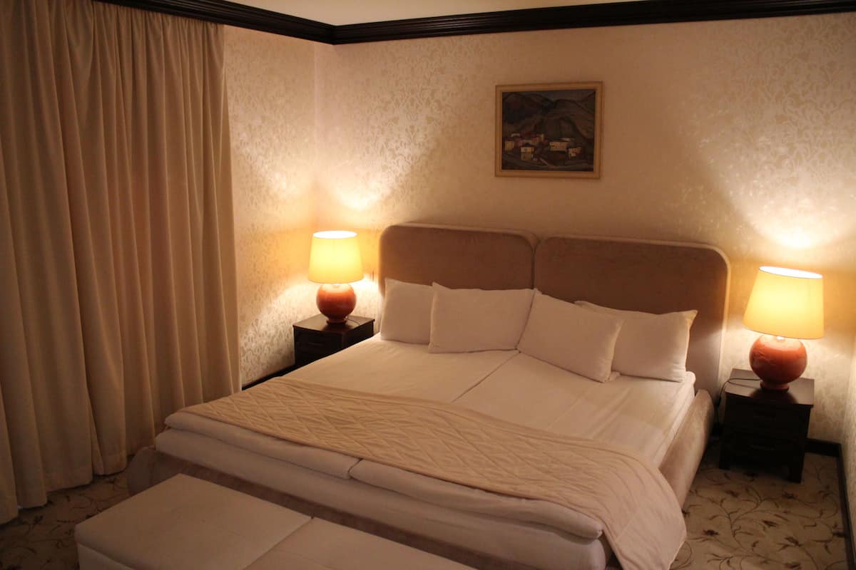 Deluxe Double Room, Balcony | Down duvets, minibar, individually furnished, blackout curtains