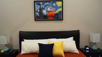Snoopy watches over as you sleep in this memory foam King bed