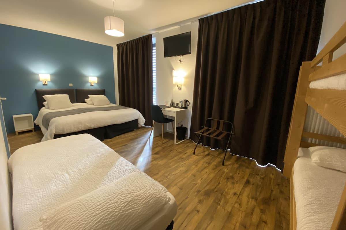 family room | 1 bedroom, individually decorated, individually furnished, desk