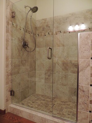 Combined shower/tub, hair dryer, towels, soap