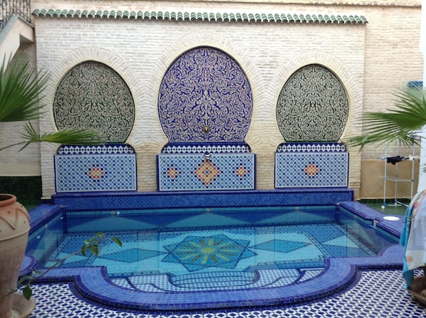 Outdoor pool, pool umbrellas, pool loungers