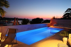 Seasonal outdoor pool, pool umbrellas, sun loungers