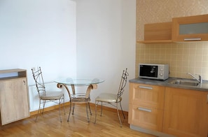 Apartamento, 1 quarto | Sala de estar