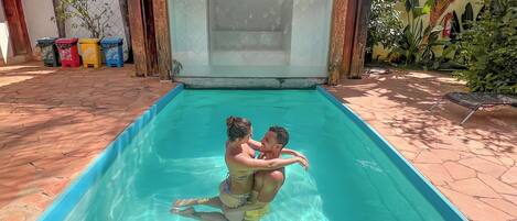 Outdoor pool, open 10:00 AM to 10:00 PM, sun loungers