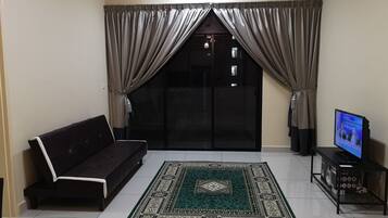 Apartment, 1 Bedroom, Kitchen, Pool View | Living area | 32-inch LED TV with cable channels, TV