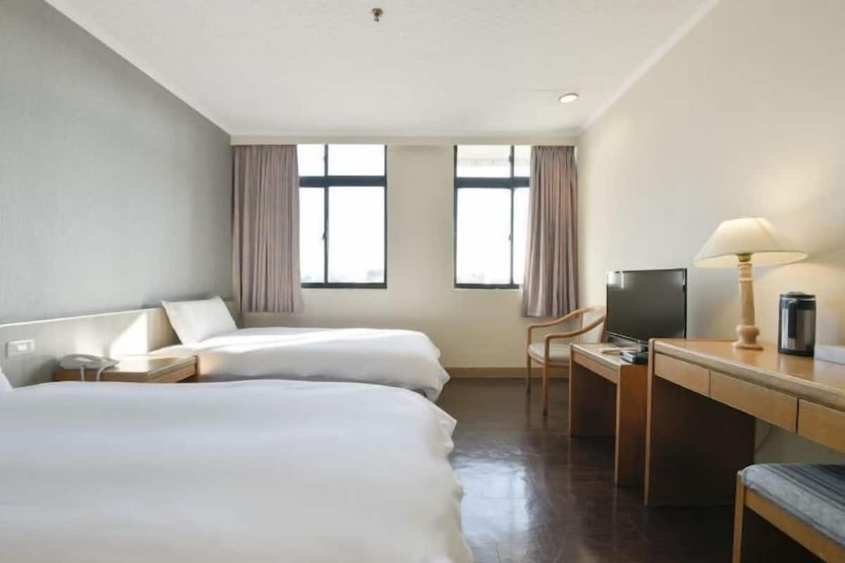 Desk, blackout curtains, soundproofing, free WiFi