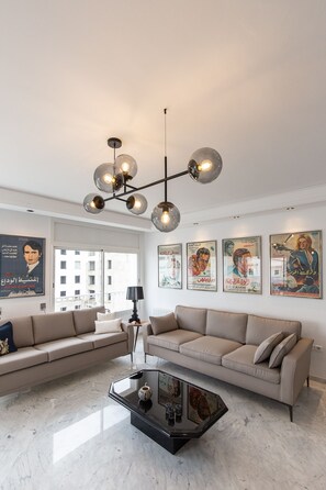 Luxury Apartment, 3 Bedrooms, Non Smoking, Lakeside | Living area | 32-inch flat-screen TV with satellite channels, TV - Hestia House (Tunis)