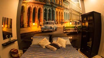 Deluxe Triple Room, 1 Bedroom, Accessible | Individually decorated, desk, blackout drapes, soundproofing