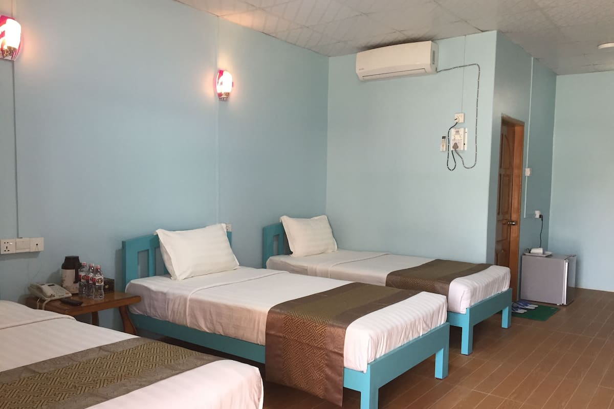 Family Triple Room | Premium bedding, minibar, desk, iron/ironing board