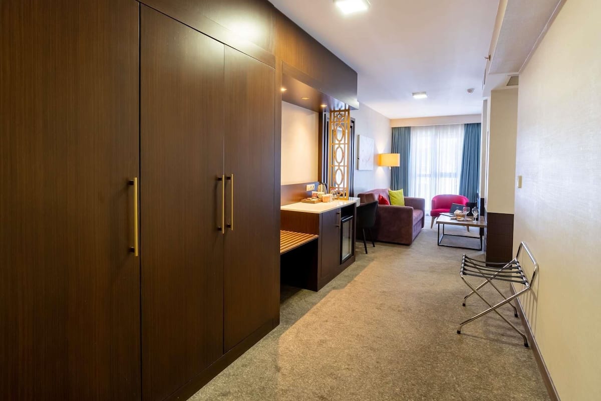 Family Suite, 2 Double Beds | Premium bedding, minibar, in-room safe, soundproofing