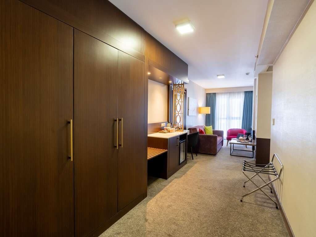 Family Suite, 2 Double Beds | Premium bedding, minibar, in-room safe, soundproofing