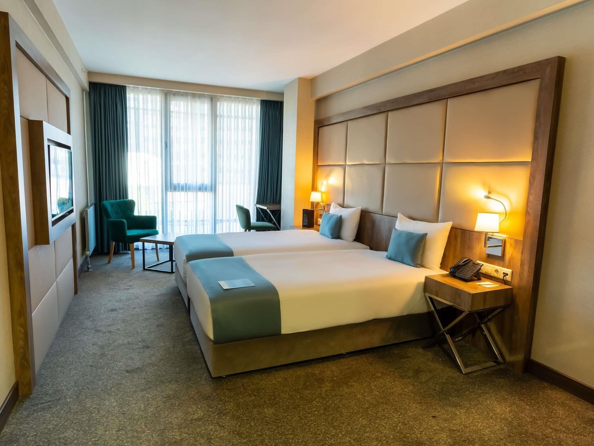 Ropa de cama de alta calidad y minibar 