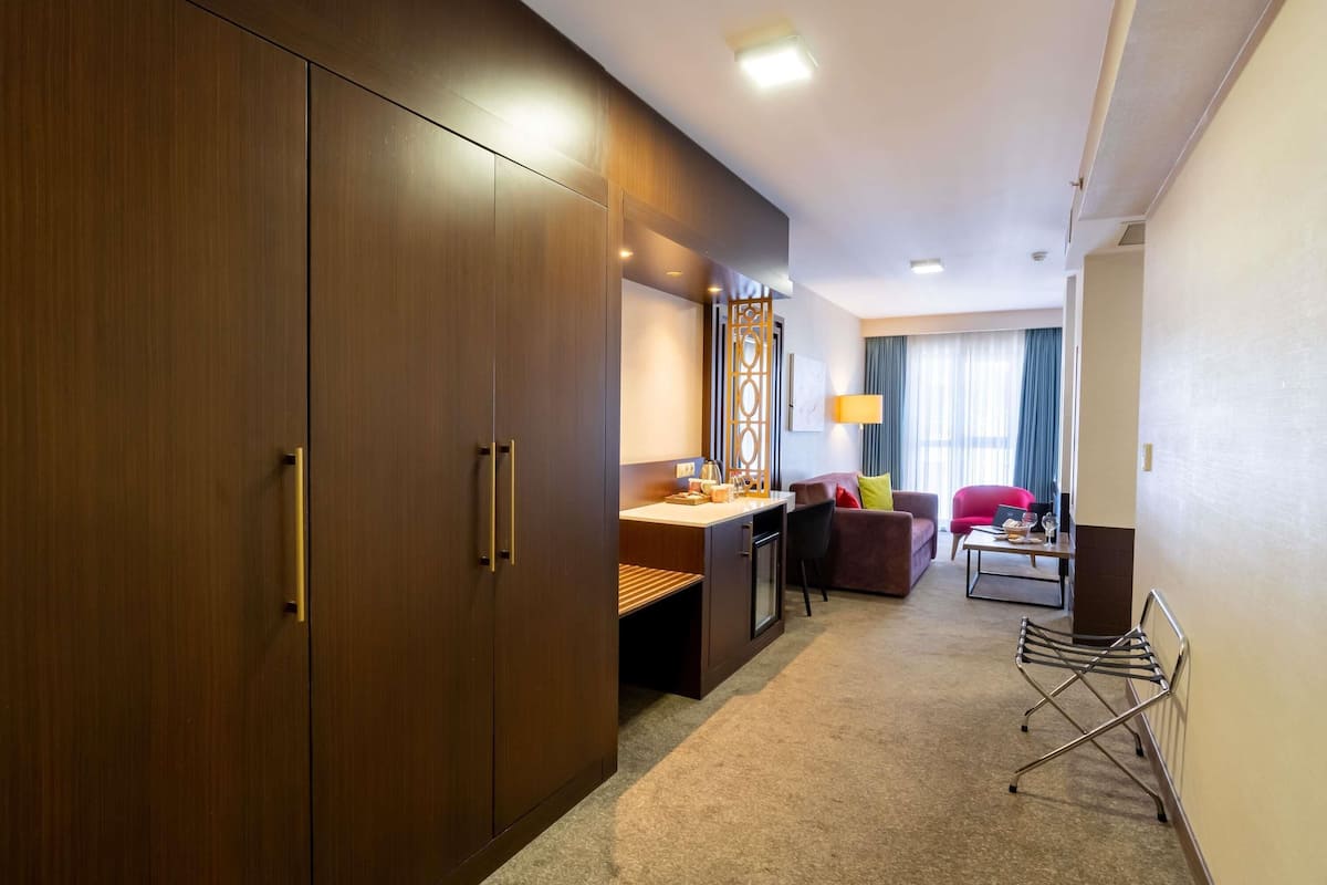 Familien-Suite, 2Â Doppelbetten | Hochwertige Bettwaren, Minibar, Zimmersafe, schallisolierte Zimmer