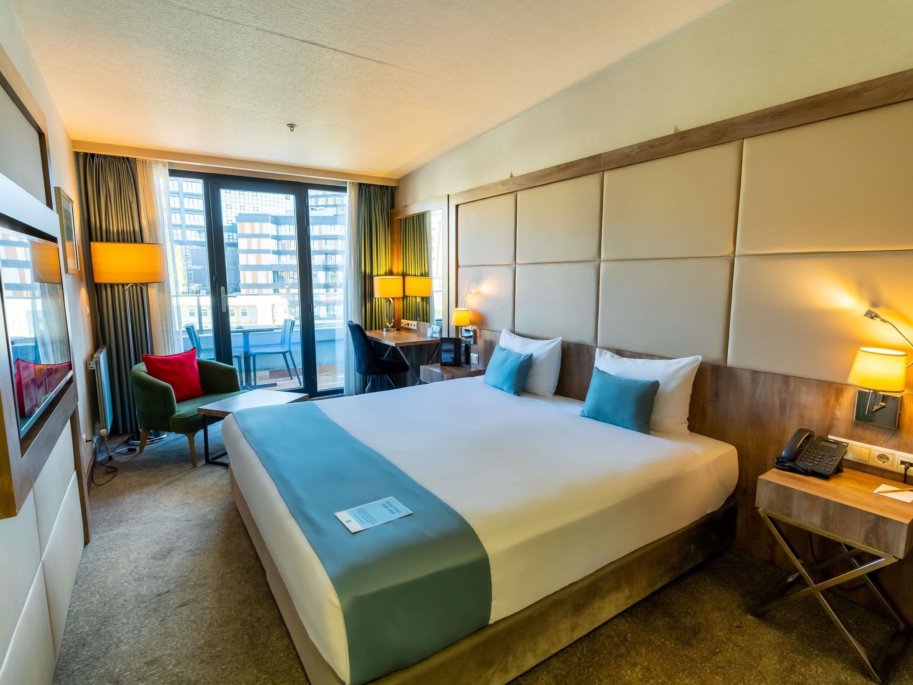 Deluxe-Zimmer, 1 Doppelbett, Balkon | Hochwertige Bettwaren, Minibar, Zimmersafe, schallisolierte Zimmer