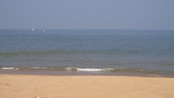 On the beach, white sand
