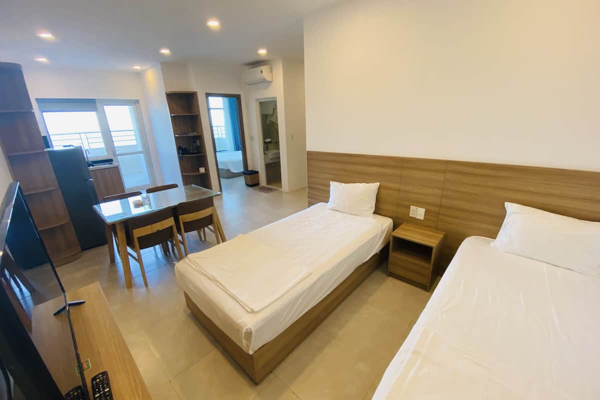family apartment | premium bedding, down duvets, in-room safe, desk