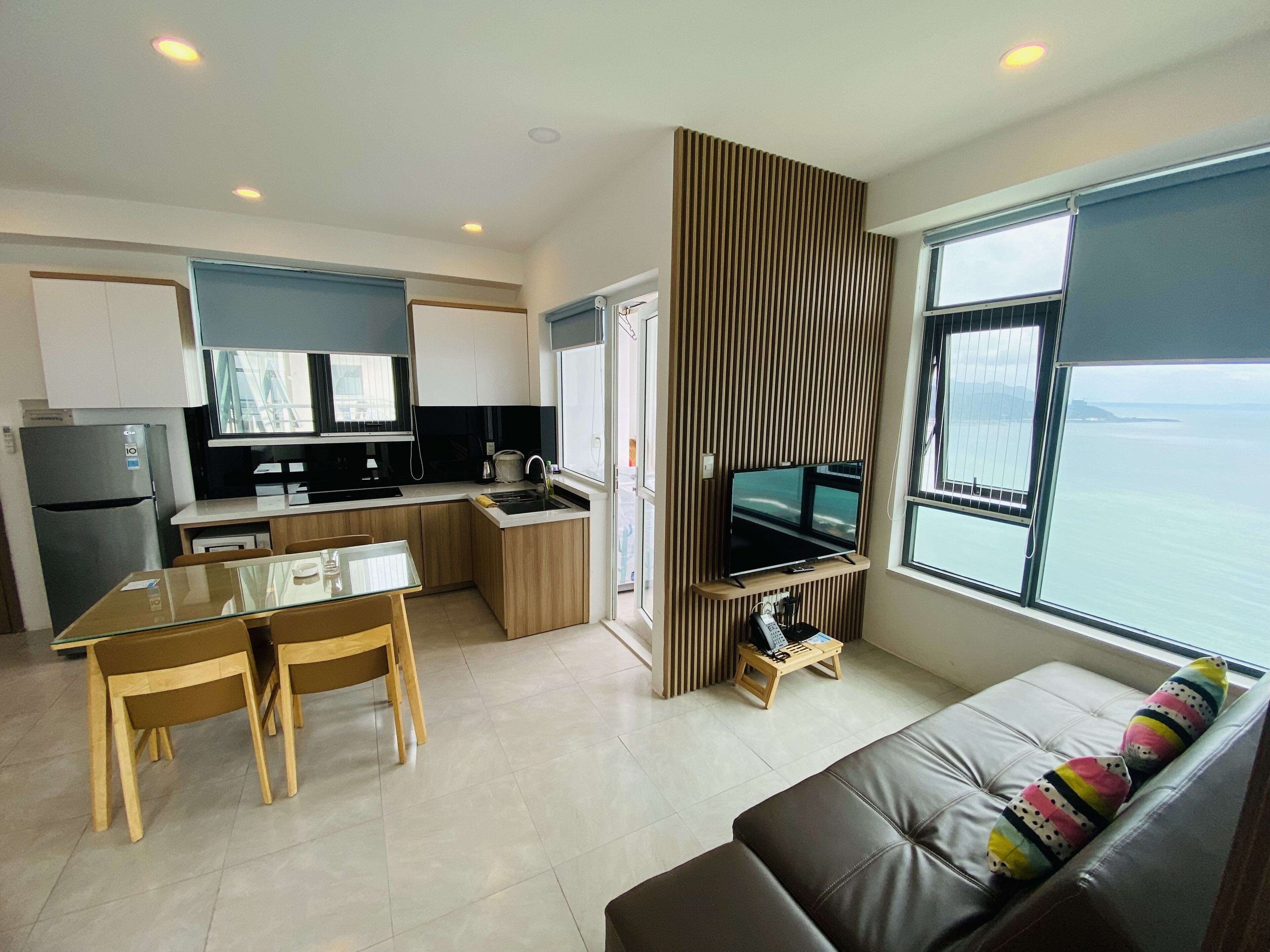 deluxe apartment, 2 bedrooms, kitchen | living area | 42-inch flat-screen tv with digital channels, tv