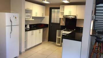 Standard Apartment, 2 Bedrooms (La Arpista) | Private kitchen | Fridge, microwave, oven, stovetop