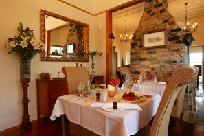 Breakfast and dinner served, local cuisine