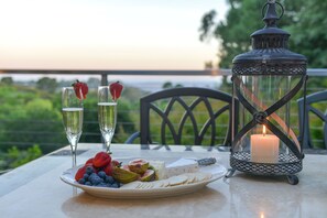 Enjoy a romantic meal amidst lush greenery and serene waters.