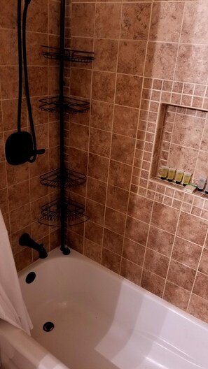 Combined shower/tub, hair dryer, towels, soap