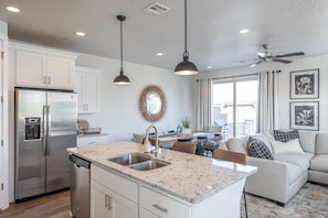 Kitchen Island View - With an open and spacious floor plan, the Dining Room and Kitchen can accommodate meal preparations for groups large or small.