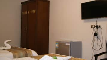 15 habitaciones, tabla de planchar con plancha, internet y ropa de cama