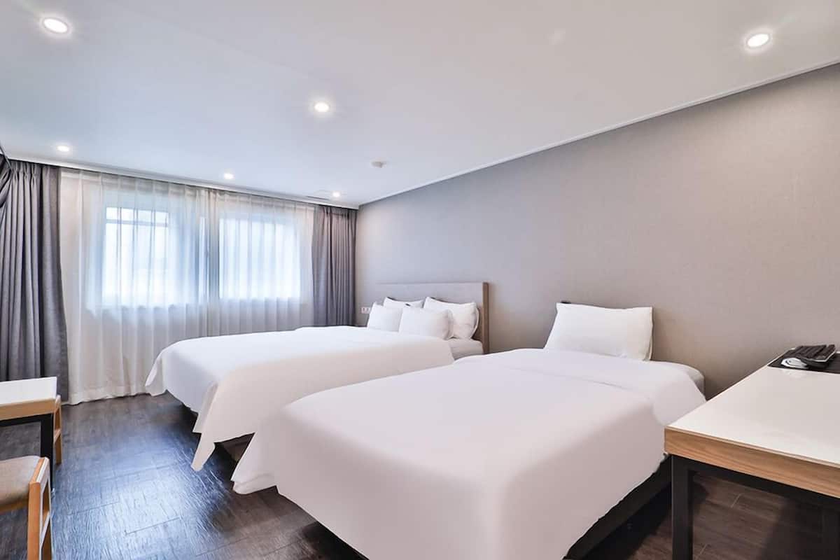 premier twin room | individually decorated, individually furnished, blackout curtains