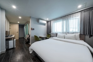 Premier Room | Individually decorated, individually furnished, blackout drapes