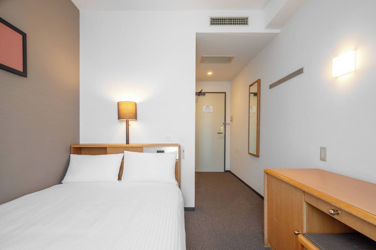 Desk, blackout curtains, iron/ironing board (on request), free WiFi