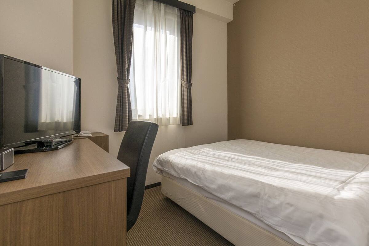 Desk, blackout curtains, iron/ironing board (on request), free WiFi