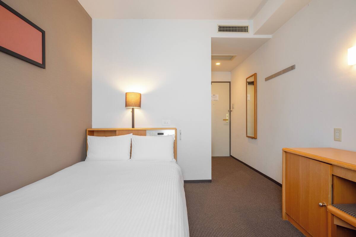Desk, blackout curtains, iron/ironing board (on request), free WiFi