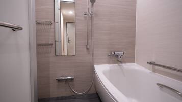 Separate tub and shower, free toiletries, hair dryer, slippers