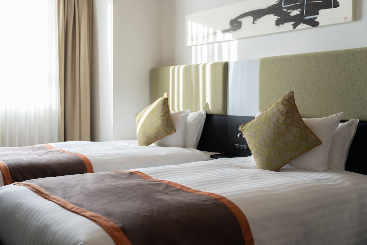 Desk, laptop workspace, free WiFi, bed sheets