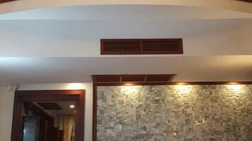 55-inch flat-screen TV with cable channels, TV, DVD player