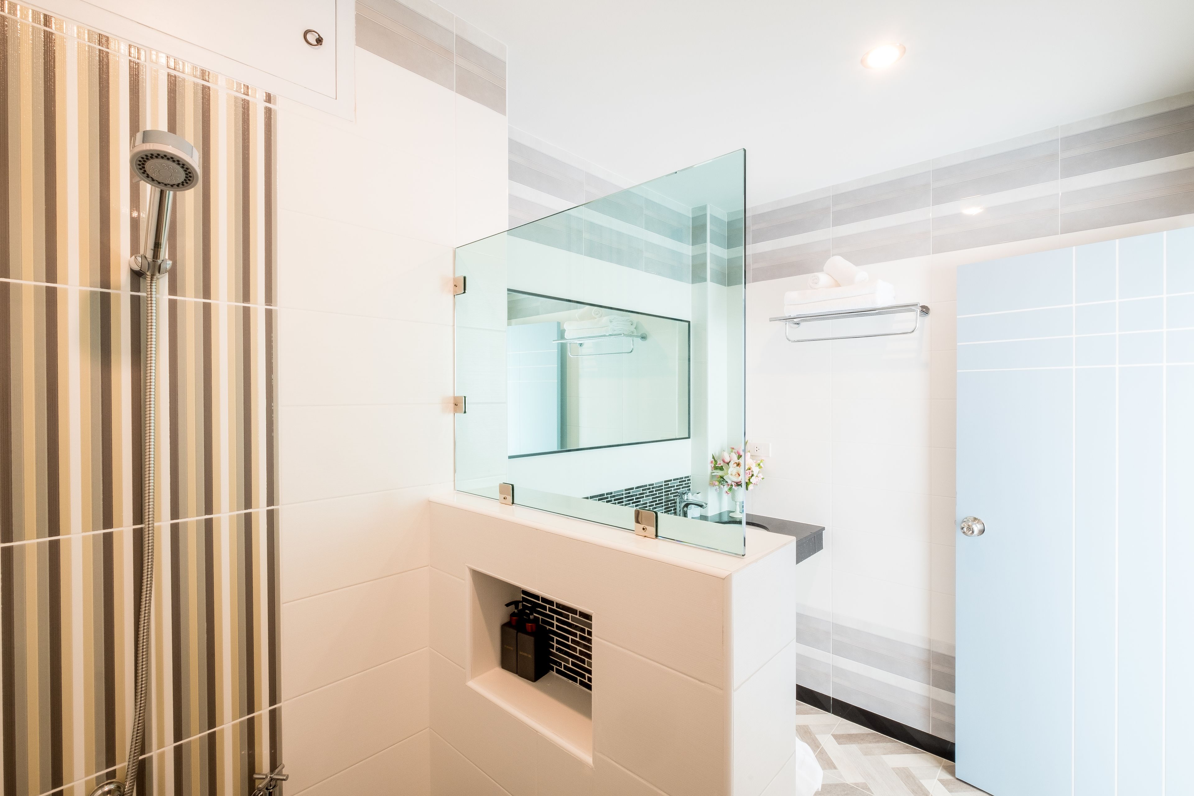 shower, free toiletries, hair dryer, towels