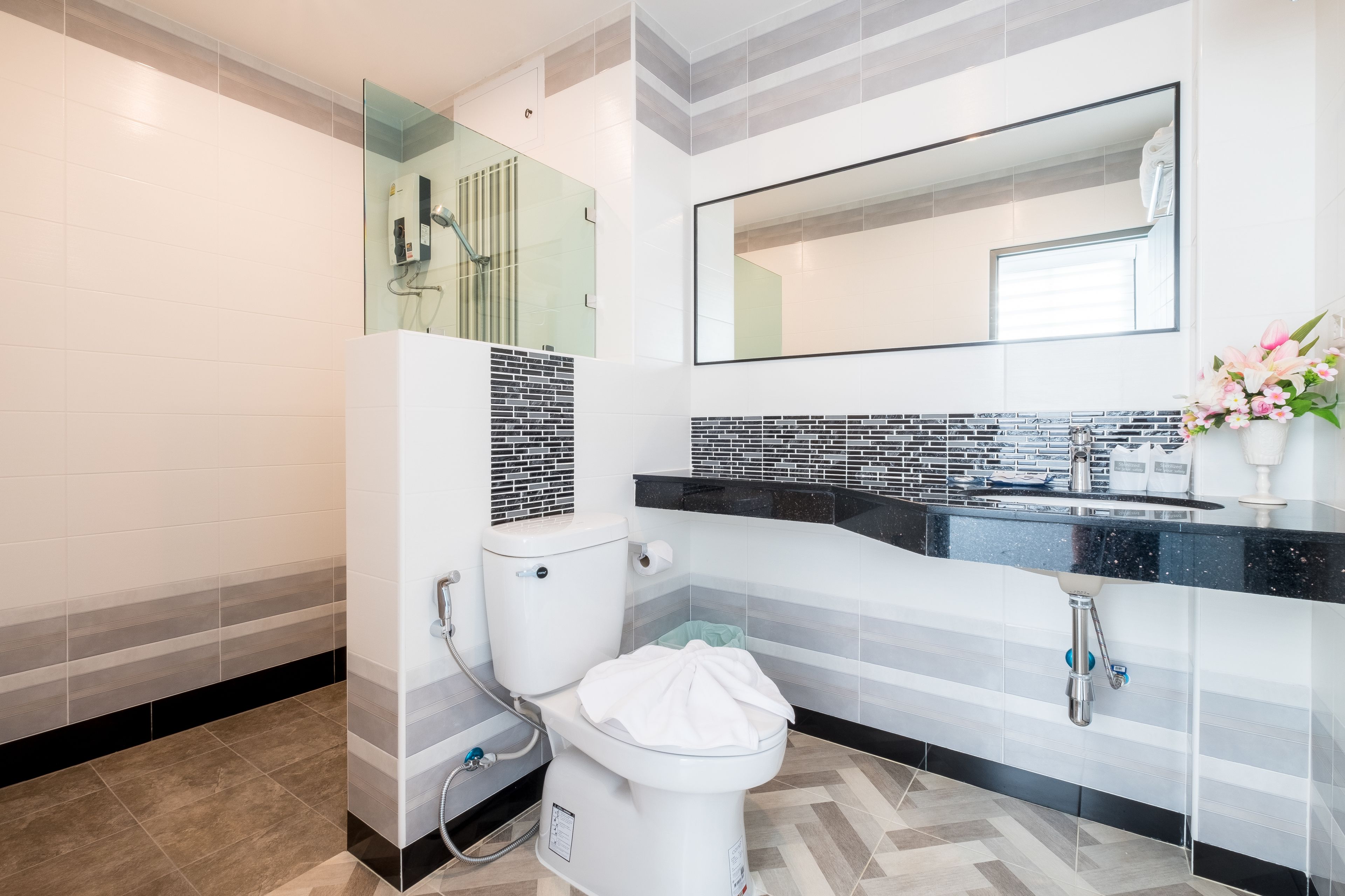 shower, free toiletries, hair dryer, towels