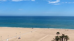 On the beach, sun-loungers