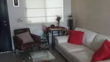 Family Townhome, 3 Bedrooms | Living area | Flat-screen TV